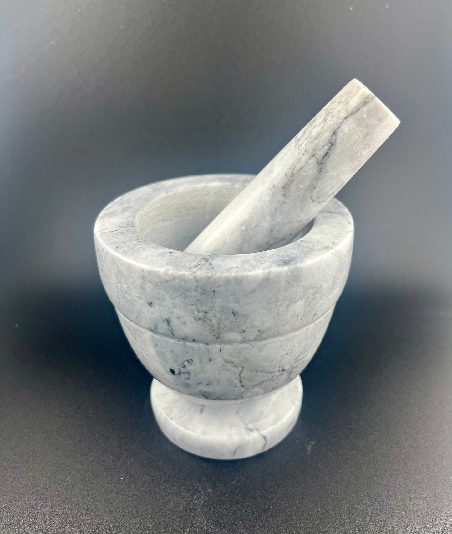 White And Gray Marble Morter Pestal