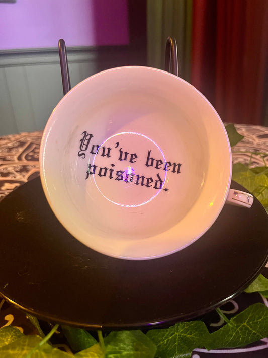 Vulgar Tea Cup and Saucer